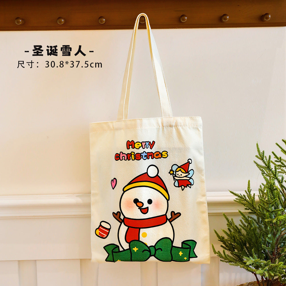 Giftwowo 1PC Cartoon Santa Canvas Bag – Large Capacity Tote for Students, Christmas Gift Bag, Reusable Shoulder Bag